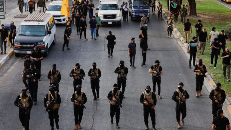 Iran-backed militia groups in Iraq prepared to disarm to avert escalating conflict with Trump