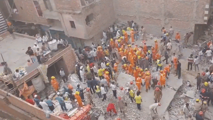 Screengrab from visuals of ongoing rescue operation at building collapse site in Mustafabad | X/@ANI