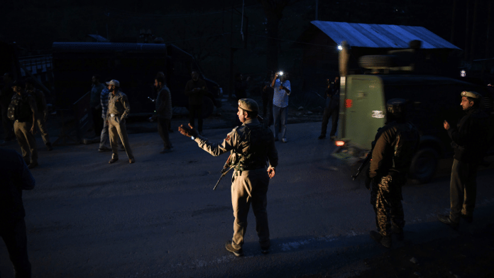 Security personnel stand guard at a check post in J&K's Pahalgam after terrorists targeted tourists, on Tuesday, 22 April 2025. | ANI