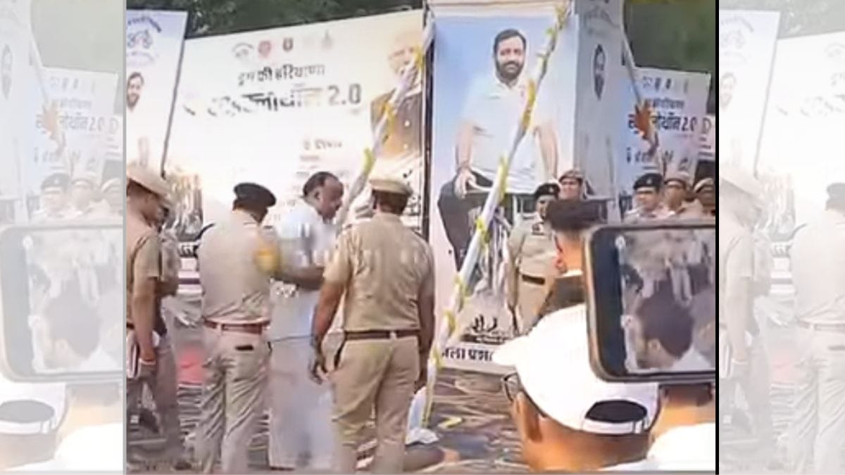 Screengrab from the viral video of BJP leader Manish Singla being escorted away