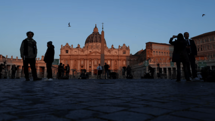 Birds fly as sunlight hits St. Peter's Basilica, following the death of Pope Francis, Vatican City, on 22 April 2025. | Kai Pfaffenbach | Reuters