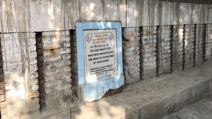 A memorial with a plaque that was previously put up in memory of the slain Sikh villagers embossed in the wall of Gurudwara Samundri Hall | Photo: Khushdeep Kaur Malhotra | ThePrint