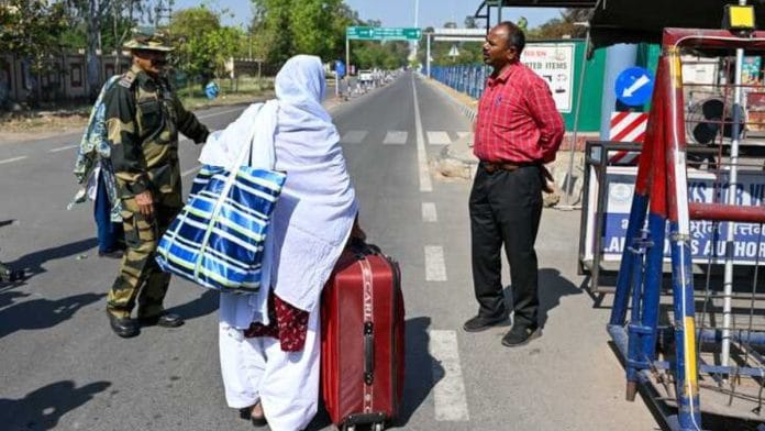 A woman crosses the Attari-Wagah border | Suraj Bisht | ThePrint