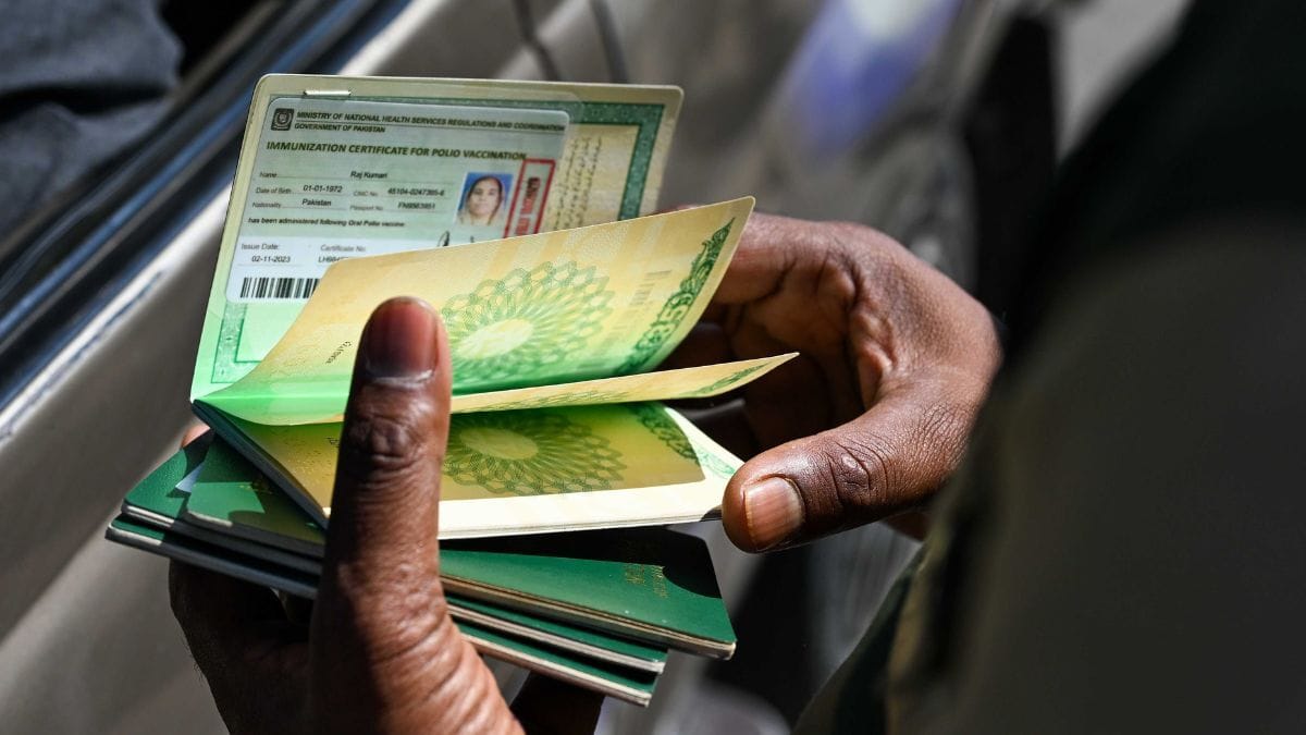 BSF personnel checking the passport of pakistani citizens | Photo: Suraj Singh Bisht, ThePrint