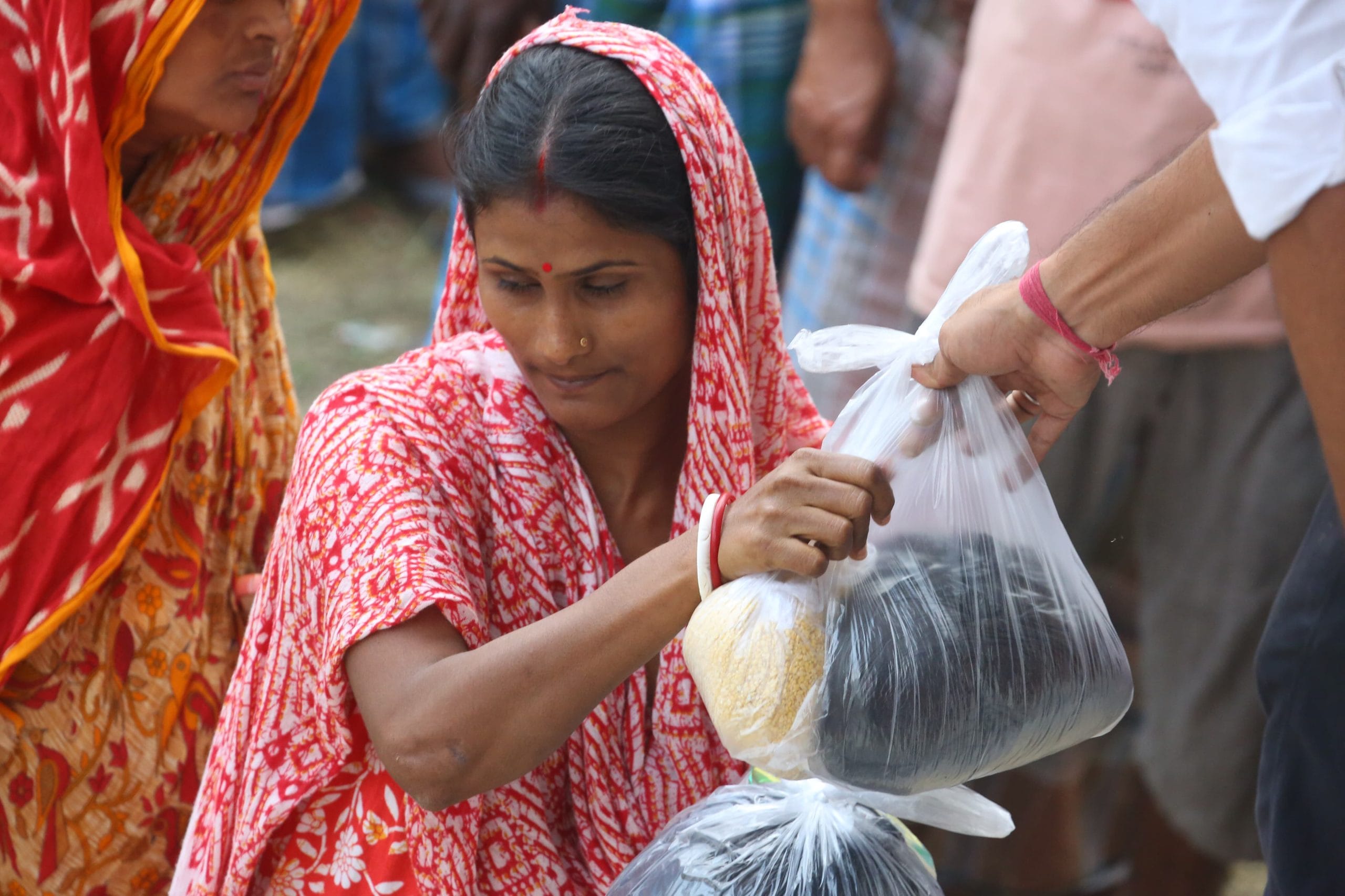 Women in queue for ration and essential items | Praveen Jain | ThePrint