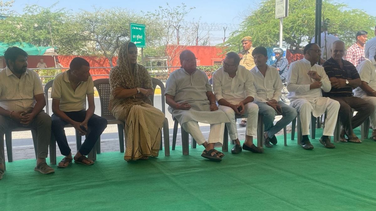 Local government officials, including Somya Gurjar, Mayor of Jaipur Nagar Nigam (Greater), await the arrival of the body | Photo: Udit Hinduja | ThePrint