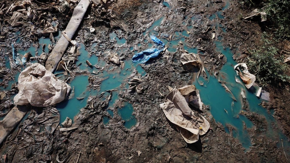 Waste water from informal plastic cleaning units is disposed openly in the fields