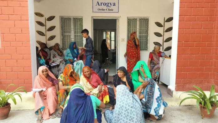 Residents of the villages surrounding Vrindavan wait for doctor's arrival at the free clinic | Shubhangi Misra | ThePrint
