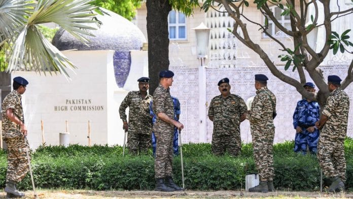 Security personnel stand guard outside the Pakistan High Commission in New Delhi Wednesday | ANI