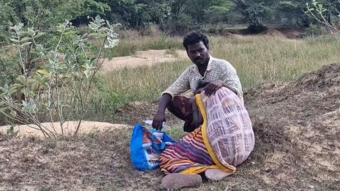 Anakamma waits for her son’s body to be exhumed | Photo: Special Arrangement