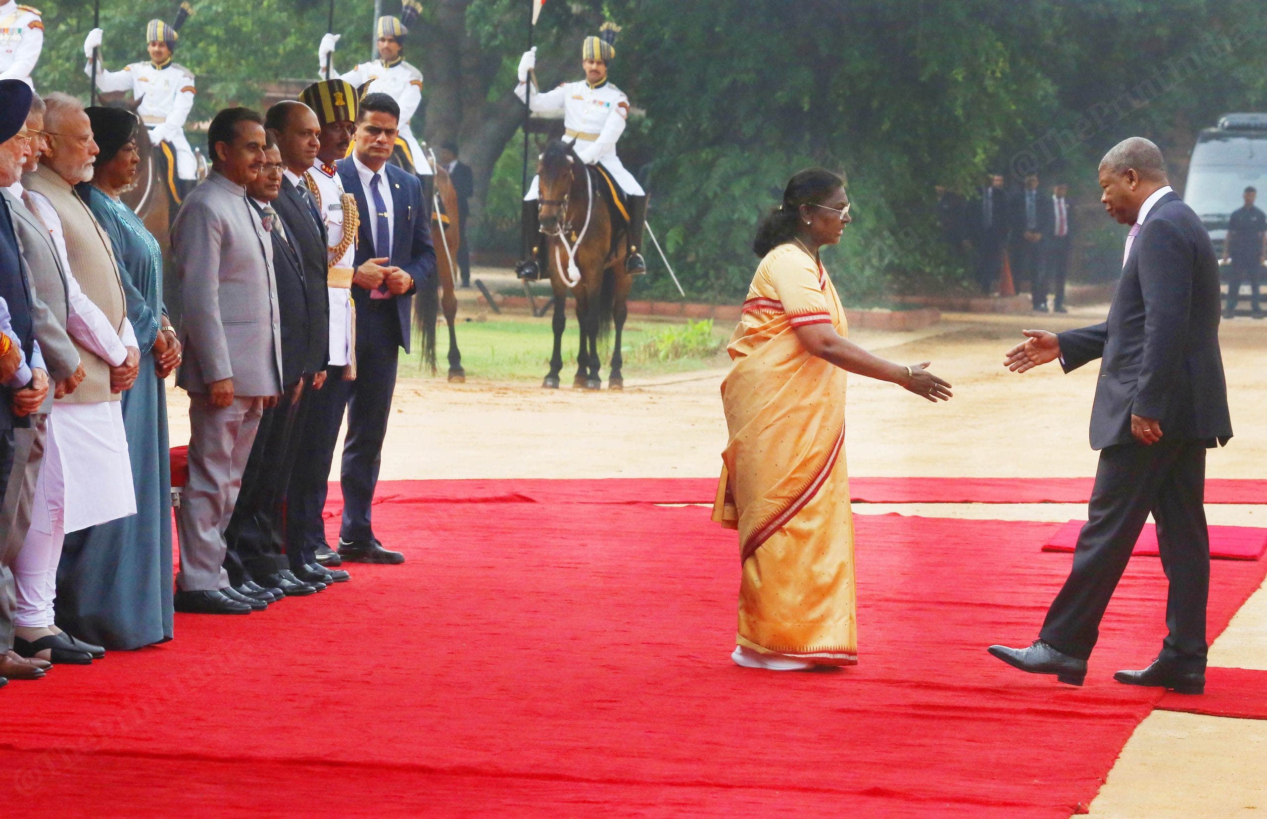 President Murmu shakes hands with Lourenço in the forecourt of the Rashtrapati Bhawan. | Photo: Praveen Jain | ThePrint