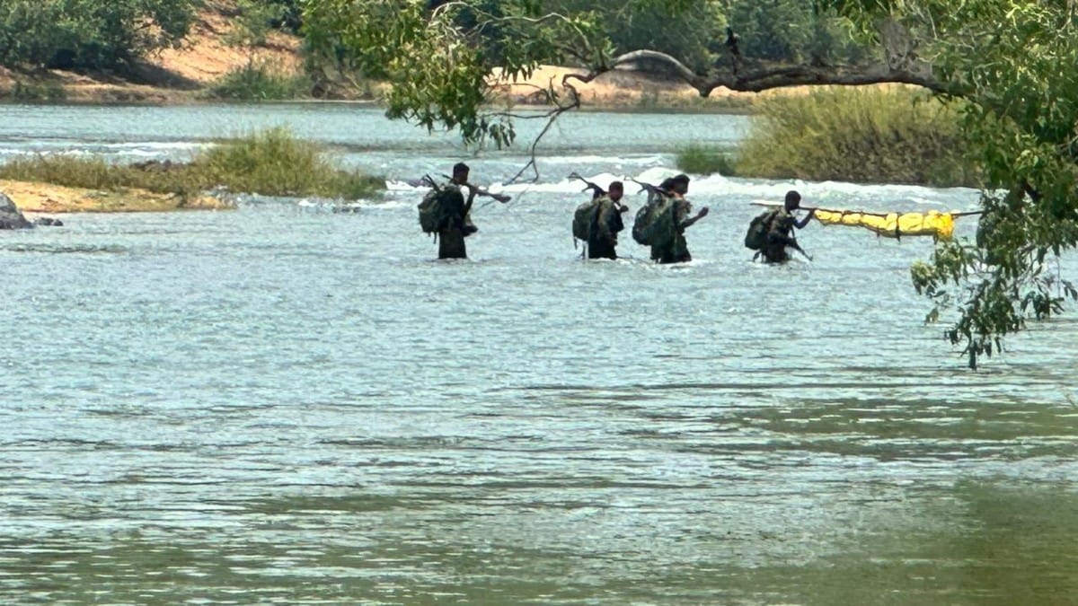 DRG jawans crossing Indravati river | By special arrangement