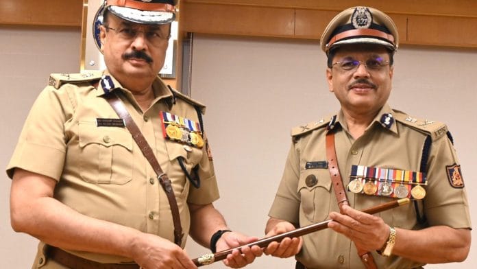 M.A. Saleem (right) takes concurrent charge as Karnataka's DG &IGP from Alok Mohan. | Photo X @masaleemips