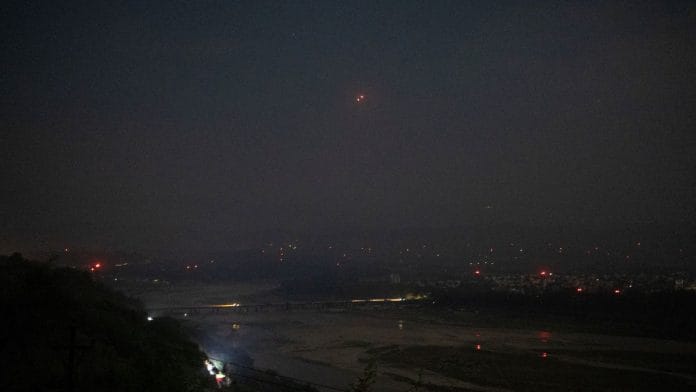India's air defence system intercepts objects in the sky during a blackout following multiple blasts in the city of Jammu on Friday. | ANI