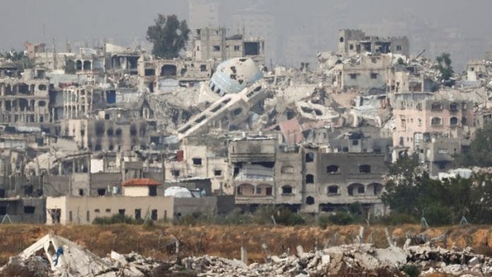 A general view of destruction in North Gaza, as seen from the Israeli side of the Israel-Gaza border, May 17, 2025. REUTERS/Amir Cohen