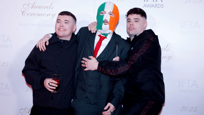 Members of Kneecap pose on the red carpet at the Irish Film and Television Academy (IFTA) Awards in Dublin, Ireland, February 14, 2025 | Reuters