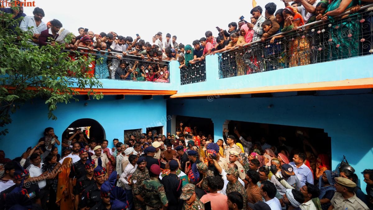 People gathered at Dinesh’s courtyard. | Manisha Mondal | ThePrint