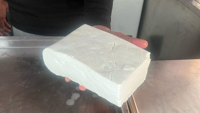 Fresh dairy paneer (shown) is easy to spot by its crumbly texture and the small cracks that form in the centre. Analogue paneer looks like a smooth, uniform white block | Photo: Triya Gulati | ThePrint