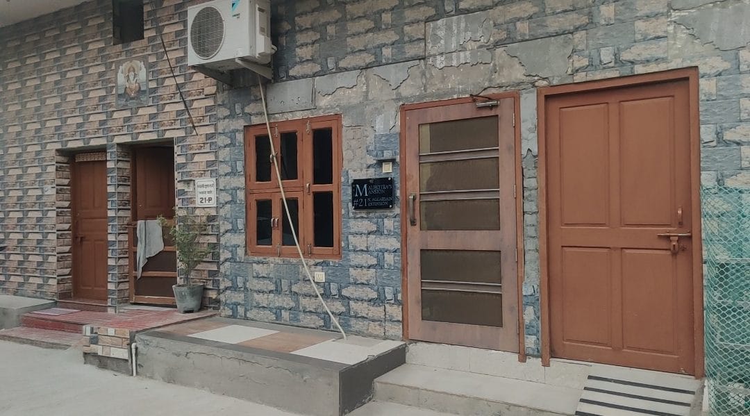 outside the house of Jyoti.