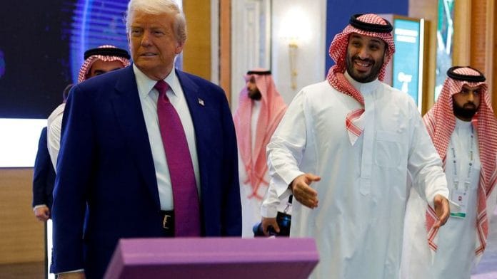 Saudi Crown Prince Mohammed Bin Salman reacts next to U.S. President Donald Trump during the Saudi-U.S. Investment Forum, in Riyadh, Saudi Arabia, on 13 May 2025. | Brian Snyder | Reuters