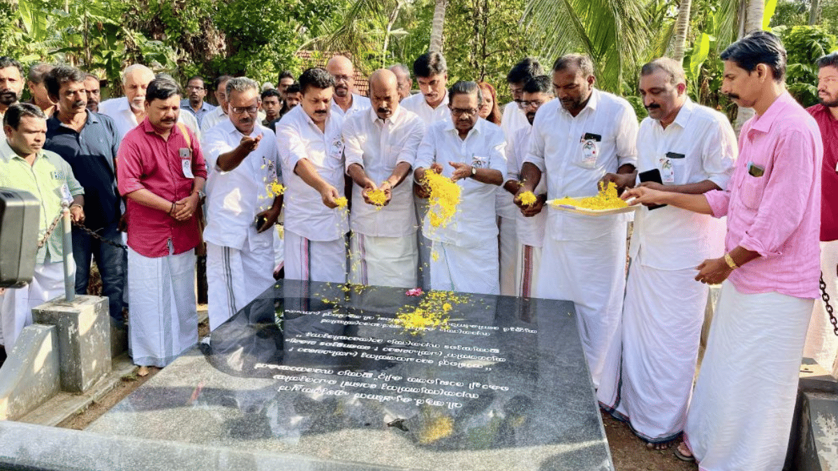 Cong leader V.M. Sudheeran and others pay floral tribute at the grave of Krishnan Ezhuthachan in Thrissur on 14 May. | Facebook: @VM Sudheeran