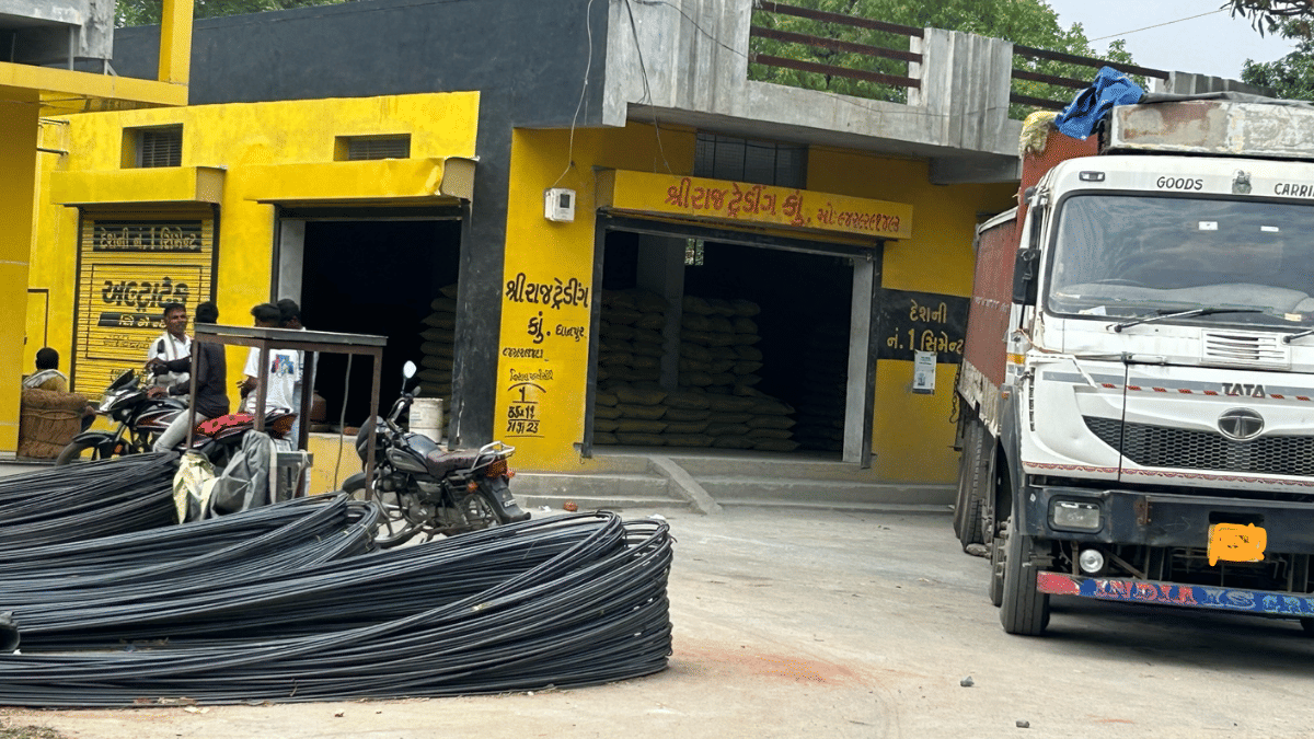 A truck offloading cement bags at an outlet of Shree Raj Trading at Piperao, Dahod | Manasi Phadke |ThePrint