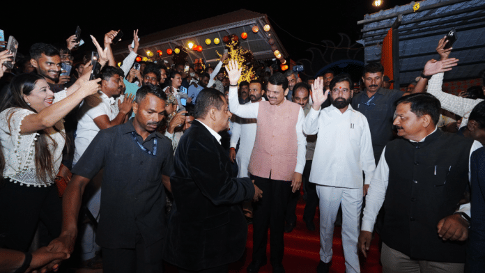 Maharashtra CM Devendra Fadnvis (pink jacket) with his deputy Eknath Shinde (dressed in all white) at Maha Paryatan Utsav | X/@CMOMaharashtra