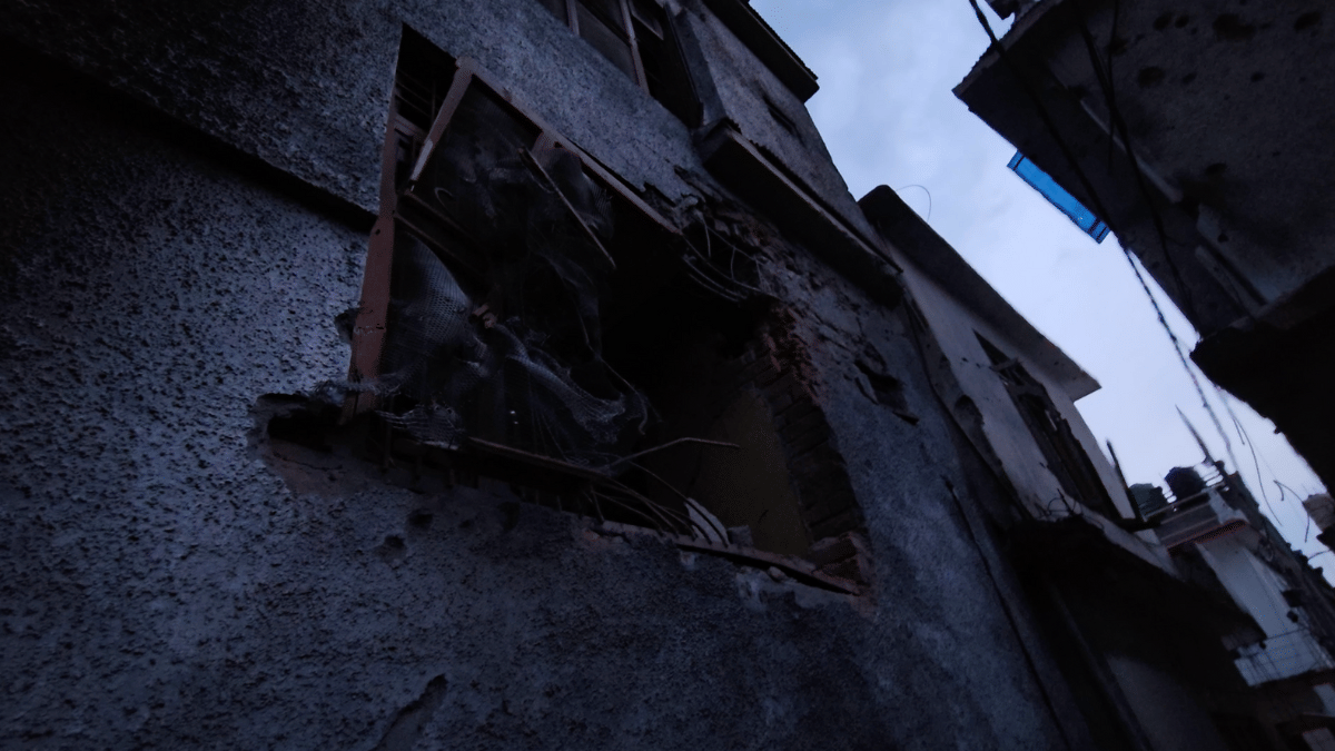 Screengrab from a video showing a building damaged in Pakistan shelling | Sajid Ali | ThePrint