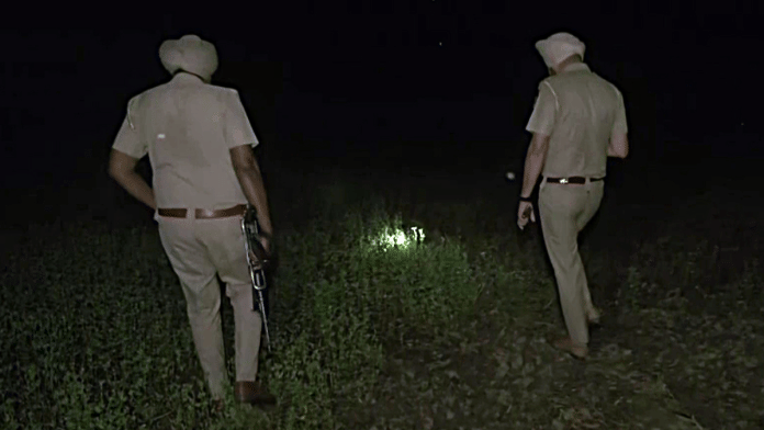 Policemen search for a Pakistani drone that was neutralised in Amritsar on Friday | ANI