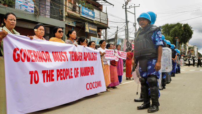 Women demand apology from Manipur Governor Ajay Kumar Bhalla over the alleged removal of 'Manipur' signage from a state government bus, in Imphal on Monday | PTI
