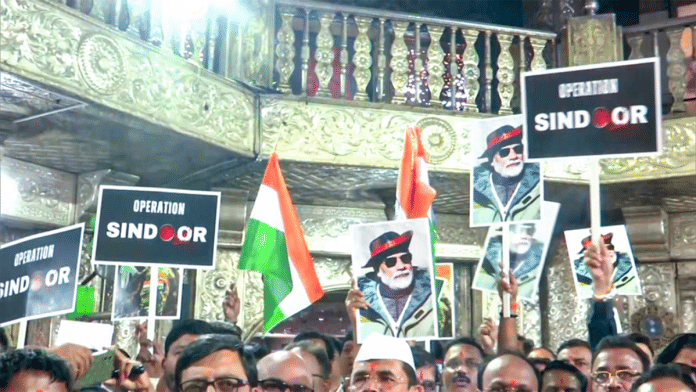 File photo of BJP supporters holding the national flag and placards of PM Narendra Modi in Pune as they celebrate Operation Sindoor | ANI q