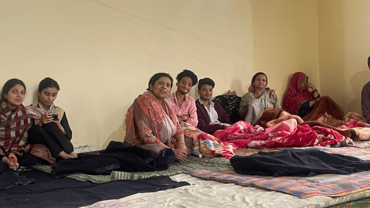 Some of the rescued border people sitting inside the homes of Sikhs in Baramulla | By Special Arrangement