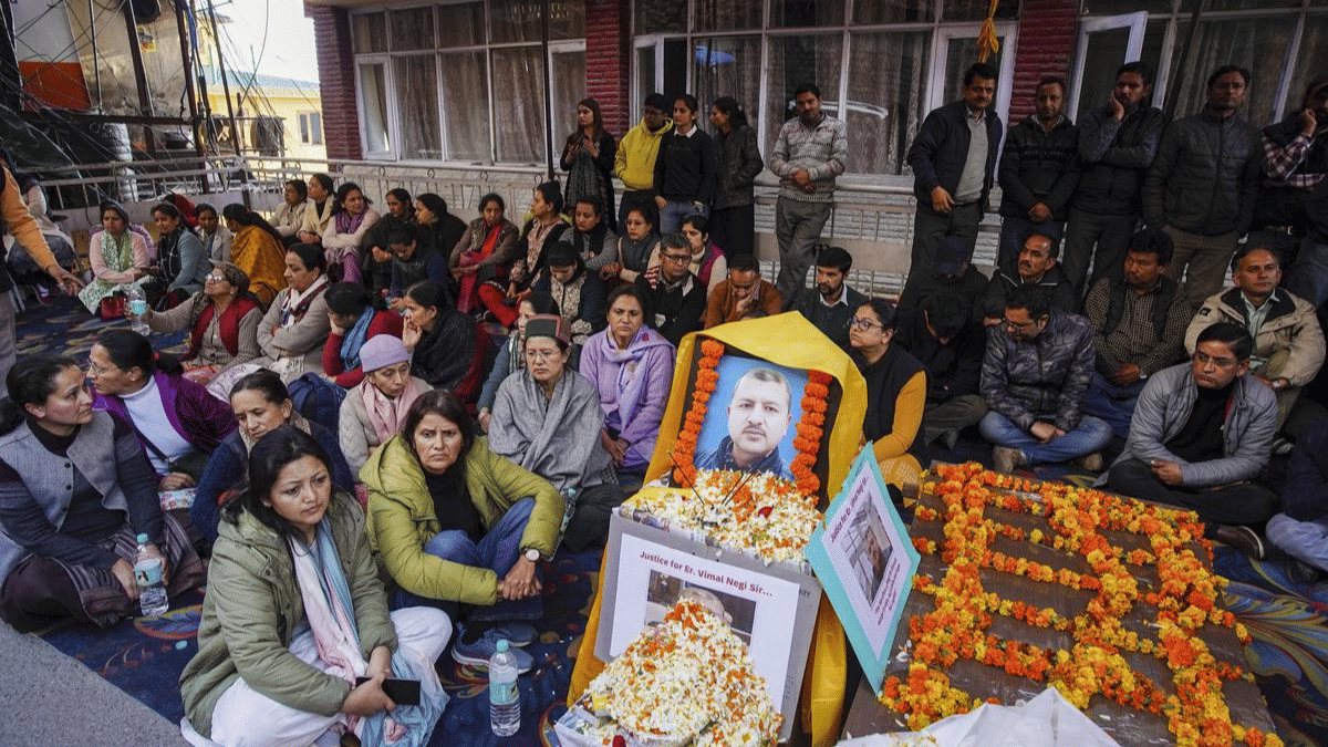 Vimal Negi's wife, family members during protest outside HPPCL office in Shimla in March | by special arrangement
