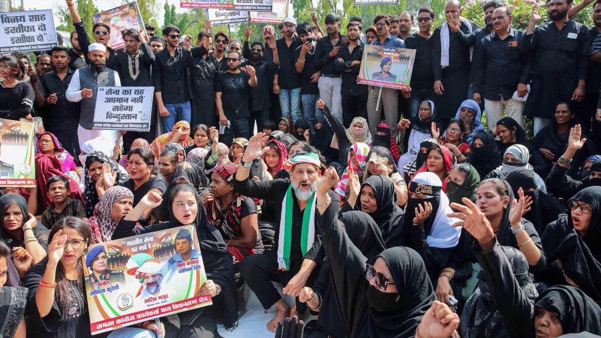 Cong MLA Arif Masood stages sit-in with party workers in Bhopal Friday demanding sacking of Madhya Pradesh minister Vijay Shah. | Photo: ANI