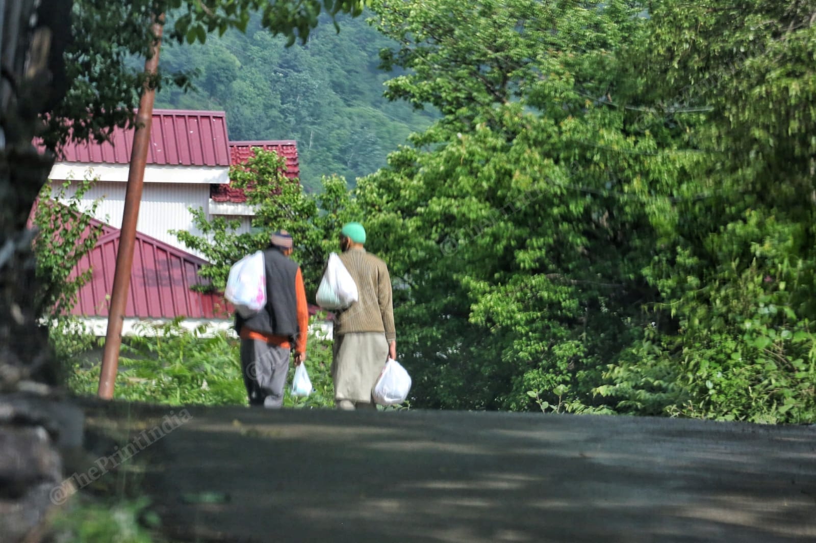Two men making a grocery run | Photo: Praveen Jain | ThePrint
