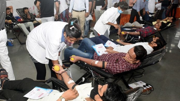 A file photo of people donating blood. | ANI