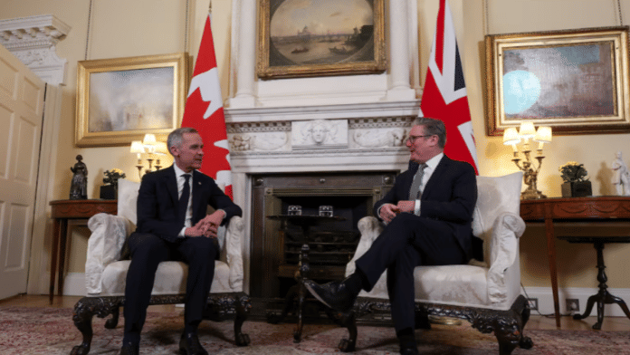 Canadian Prime Minister Mark Carney meets with British Prime Minister Keir Starmer at No. 10 Downing Street in London, Britain on 17 March 2025. | File Photo | Carlos Osorio | Reuters