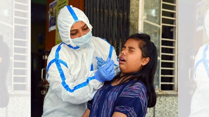 A child gets tested for COVID-19 | ANI