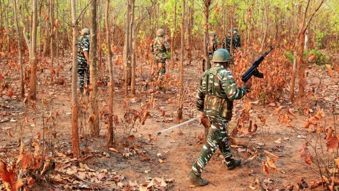 CRPF personnel patrolling the forest area following the recoveries of IEDs planted by naxals, June 2023