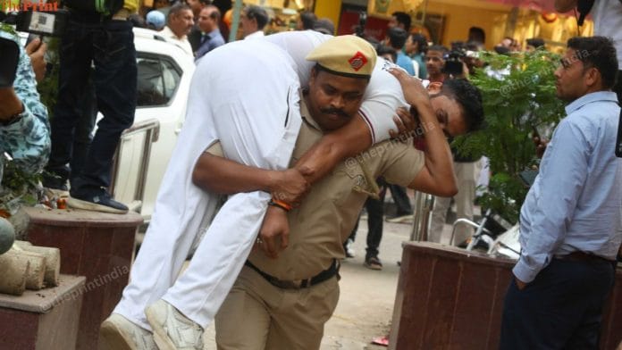 The simulation of a rescue operation at Khan Market during mock drills. | Praveen Jain | ThePrint