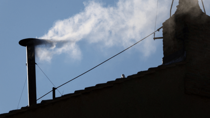 White smoke rises from the chimney on the Sistine Chapel, indicating that a new pope has been elected at the Vatican, May 8, 2025 | Reuters