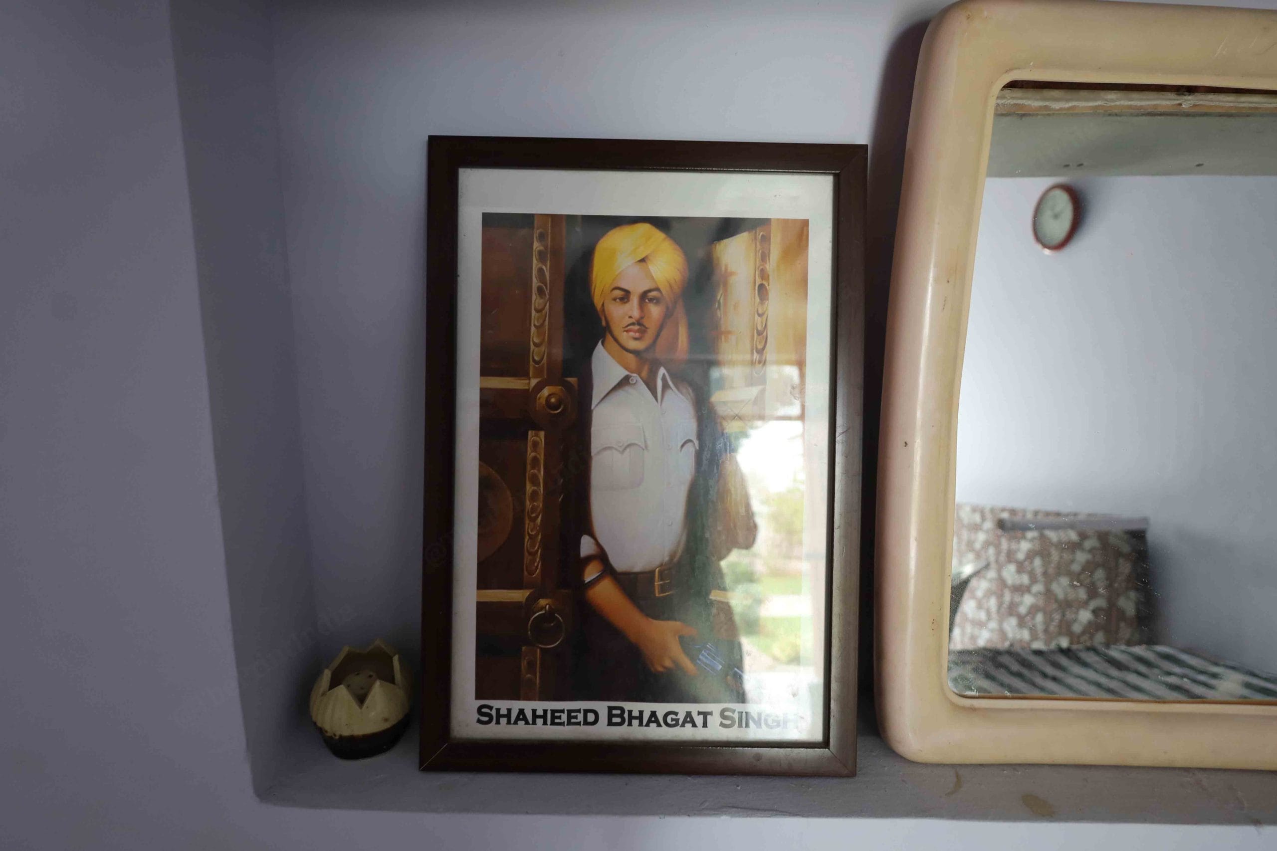 A photo of Bhagat Singh is kept in the room along with Sikh gurus | Manisha Mondal, ThePrint