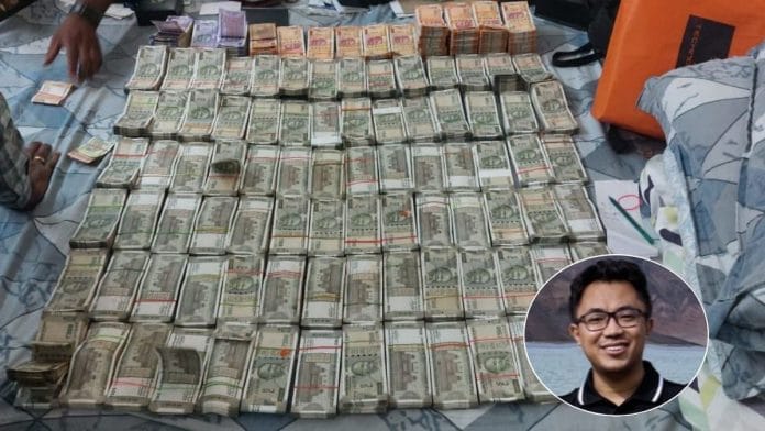 Money recovered during search at IAS officer Dhiman Chakma's (bottom right) government residence. | X