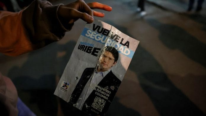A campaign poster from where Miguel Uribe was shot during a campaign event, in Bogota, Colombia, on 7 June 2025. | Luisa Gonzalez | Reuters