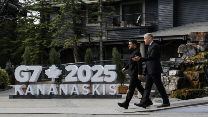 Canadian Prime Minister Mark Carney and Ukrainian President Volodymyr Zelenskiy walk as they attend the G7 Leaders' Summit in Kananaskis, in Alberta, Canada, June 17, 2025 | Reuters