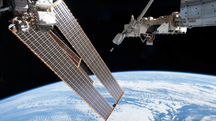 A view of Light-1 CubeSat outside of the International Space Station. | NASA