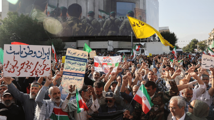 People attend a protest against the U.S attack on nuclear sites, amid the Iran-Israel conflict, in Tehran, Iran, on 22 June 2025. | Majid Asgaripour | WANA (West Asia News Agency) via Reuters
