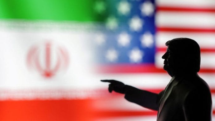 A 3D-printed miniature model depicting U.S. President Donald Trump, Iranian and U.S. flags in this illustration taken on 17 April 2025. | Illustration | Dado Ruvic | Reuters