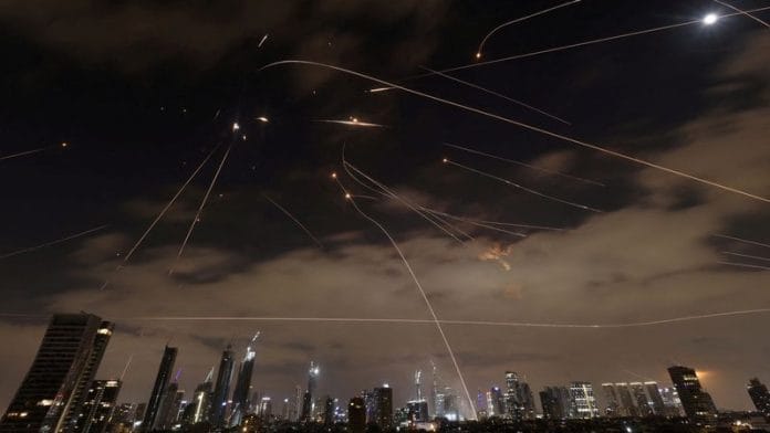 Missiles launched from Iran are intercepted as seen from Tel Aviv, Israel, on 16 June 2025. | Ronen Zvulun |