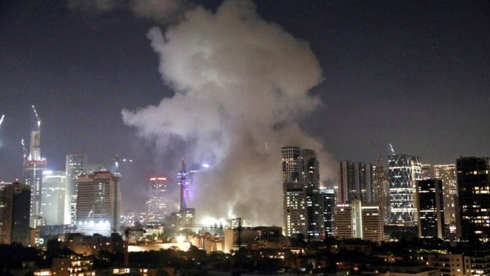Smoke billows following missile attack from Iran on Israel, at Tel Aviv on 13 June, 2025 | Reuters/Gideon Markowicz